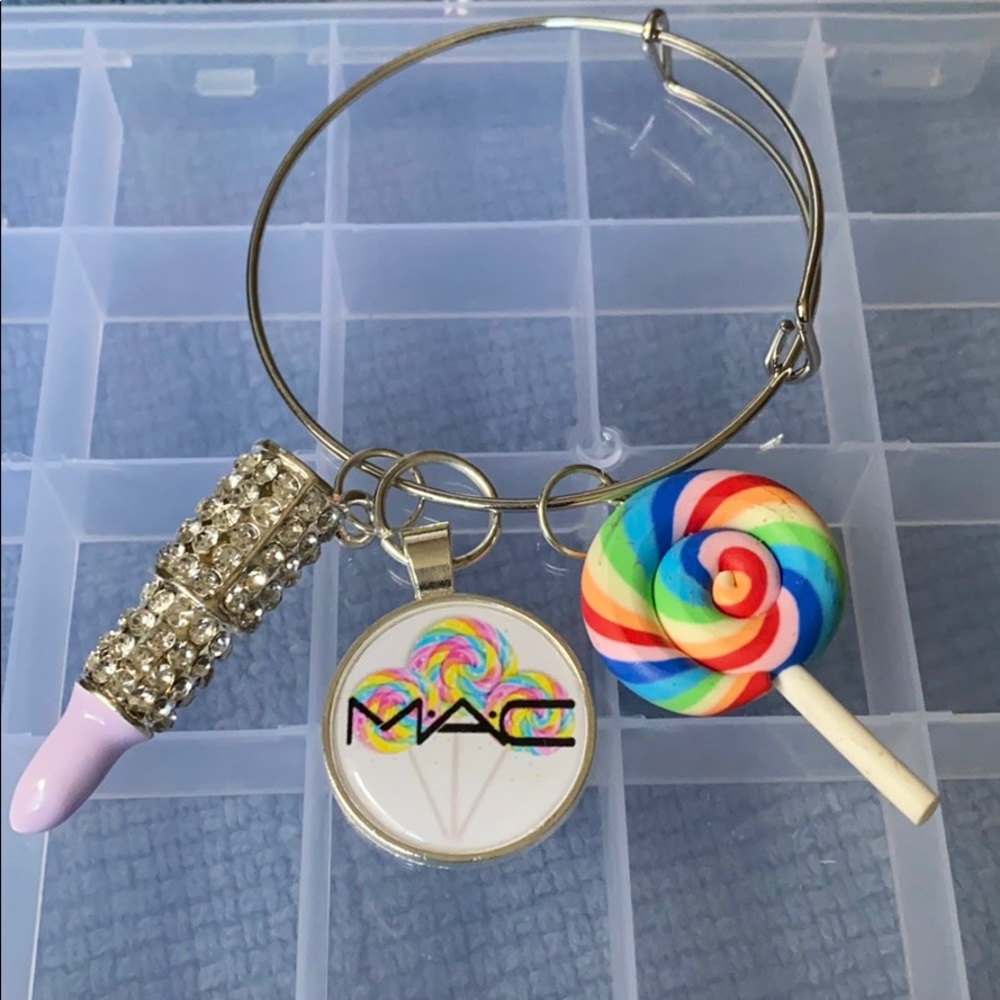 Silver plated bangle with charms